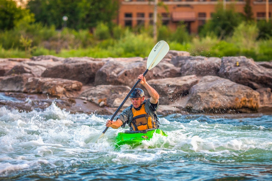 Kayaker on Brennan's Wave in Downtown Missoula