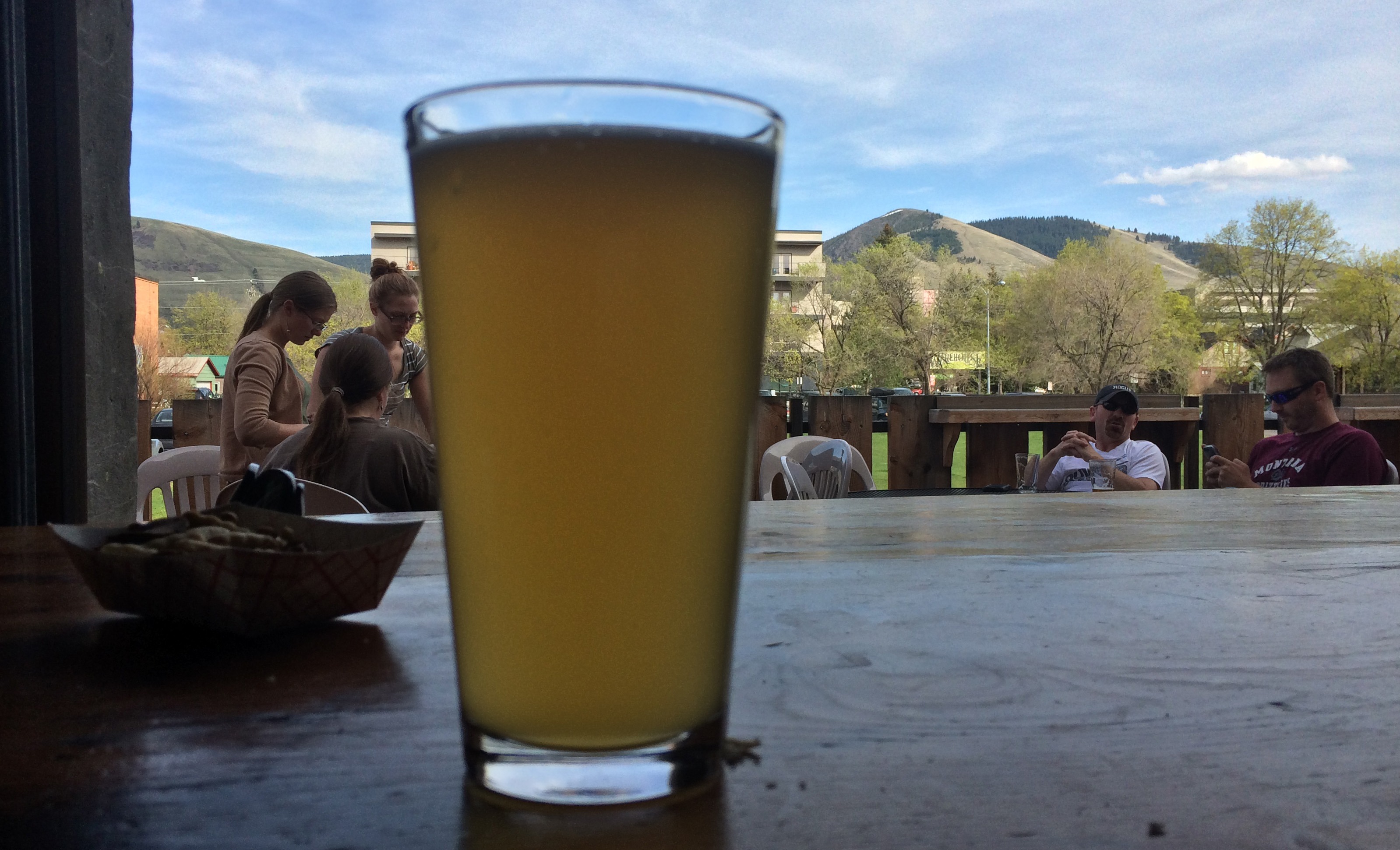 A beer and a view from Draught Works Brewery in Missoula