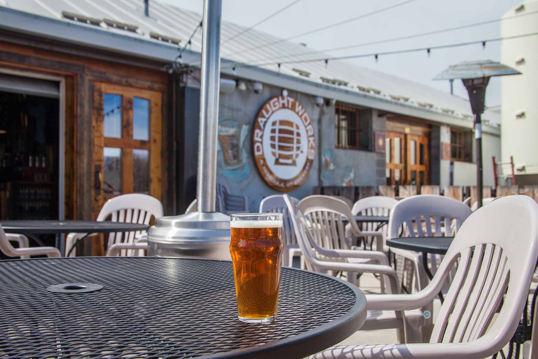 The patio at Draught Works Brewery in Missoula, Montana