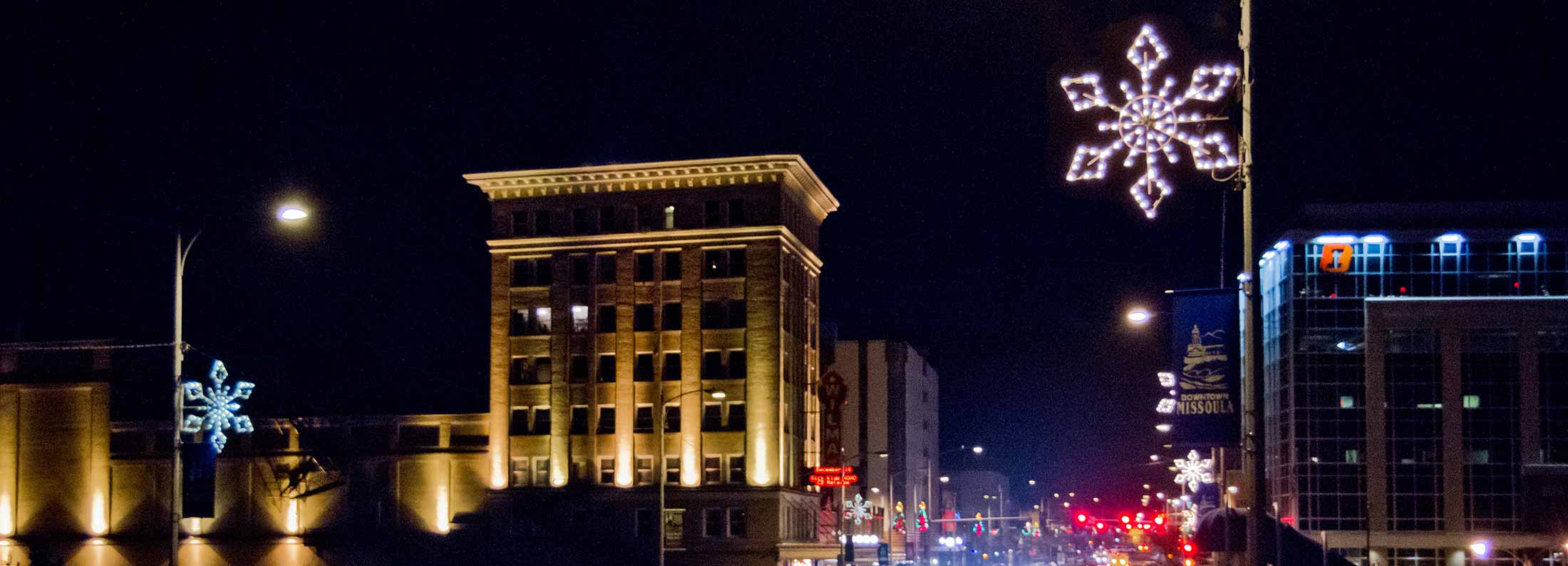 Snowflakes and holiday decorations light up downtown Missoula after the Parade of Lights