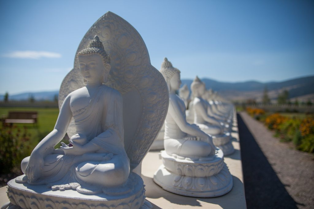  Sculpture lined pathway at the Garden of One Thousand Buddhas just north of Missoula, Montana